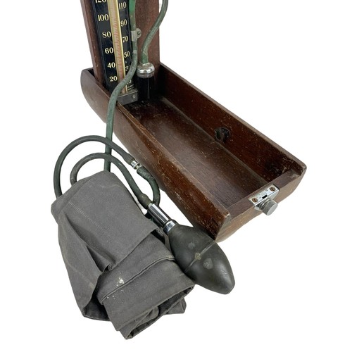 371d - A vintage Accoson sphygmomanometer (blood pressure monitor) walnut model in box. 34cm.