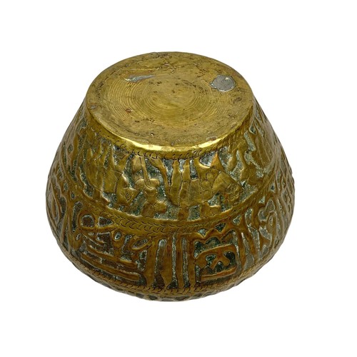 42b - A pair of large mid 19th century Persian brass planters with decoration describing the “Middle Easte... 