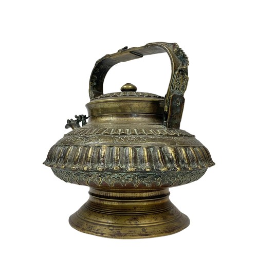 42c - A large 19th century heavy ornate heavy brass Middle Eastern kettle decorated with mythical dragons ... 