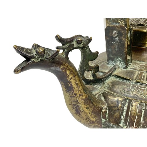 42c - A large 19th century heavy ornate heavy brass Middle Eastern kettle decorated with mythical dragons ... 