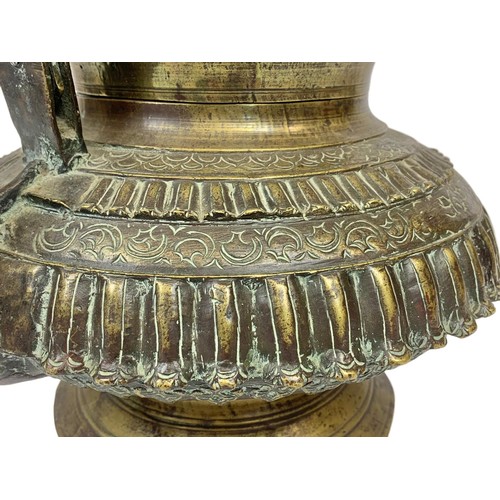 42c - A large 19th century heavy ornate heavy brass Middle Eastern kettle decorated with mythical dragons ... 