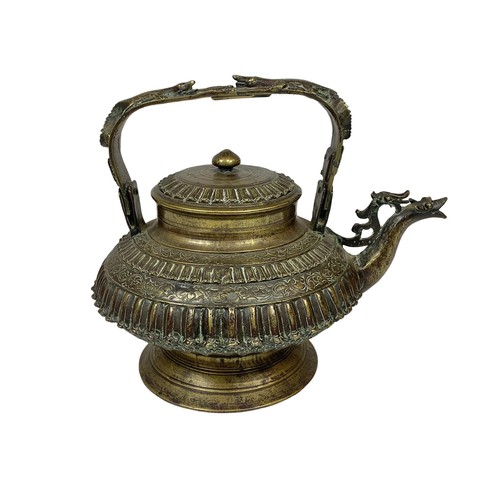 42c - A large 19th century heavy ornate heavy brass Middle Eastern kettle decorated with mythical dragons ... 