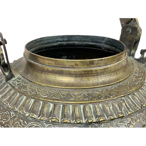 42c - A large 19th century heavy ornate heavy brass Middle Eastern kettle decorated with mythical dragons ... 