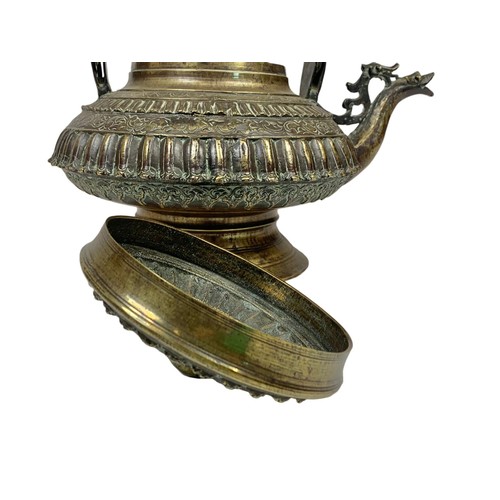 42c - A large 19th century heavy ornate heavy brass Middle Eastern kettle decorated with mythical dragons ... 