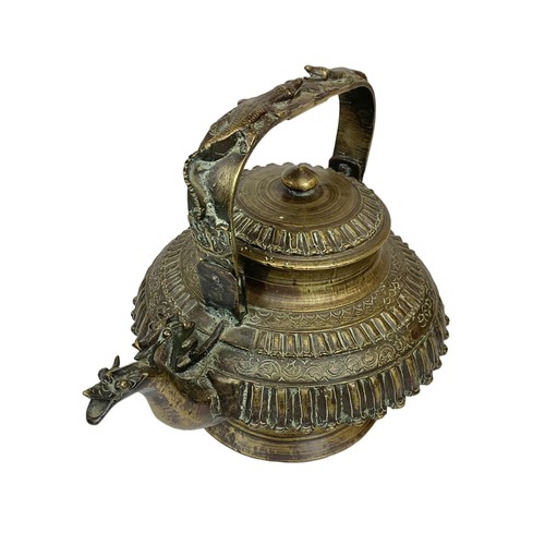 42c - A large 19th century heavy ornate heavy brass Middle Eastern kettle decorated with mythical dragons ... 