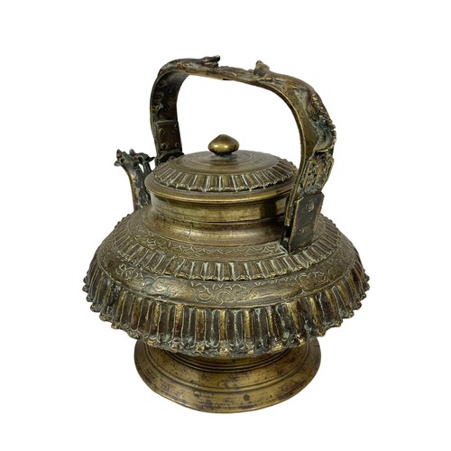 42c - A large 19th century heavy ornate heavy brass Middle Eastern kettle decorated with mythical dragons ... 