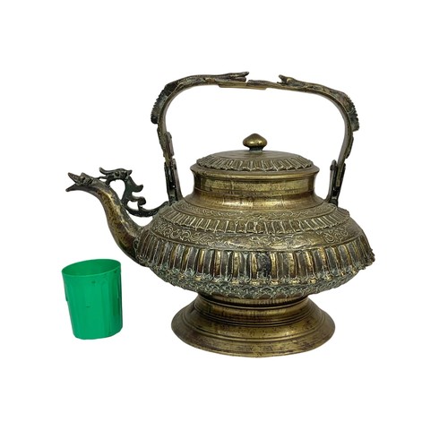 42c - A large 19th century heavy ornate heavy brass Middle Eastern kettle decorated with mythical dragons ... 