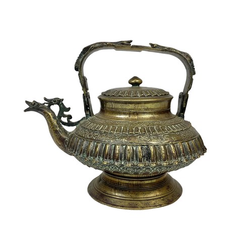 42c - A large 19th century heavy ornate heavy brass Middle Eastern kettle decorated with mythical dragons ... 