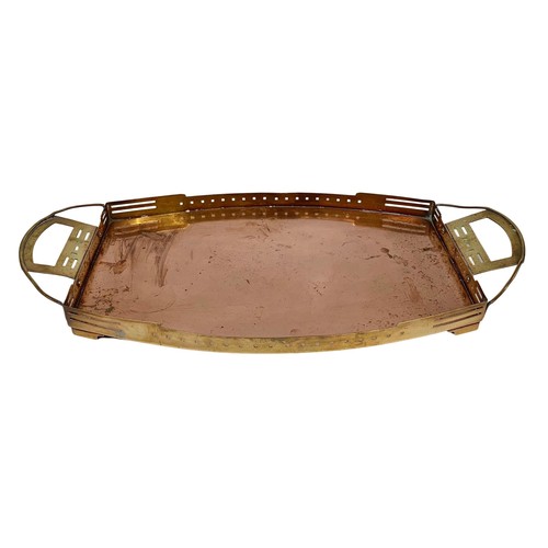 42f - An Arts & Crafts ornate copper and brass tray. Circa 1900/1910. 59.5 x 41.5cm