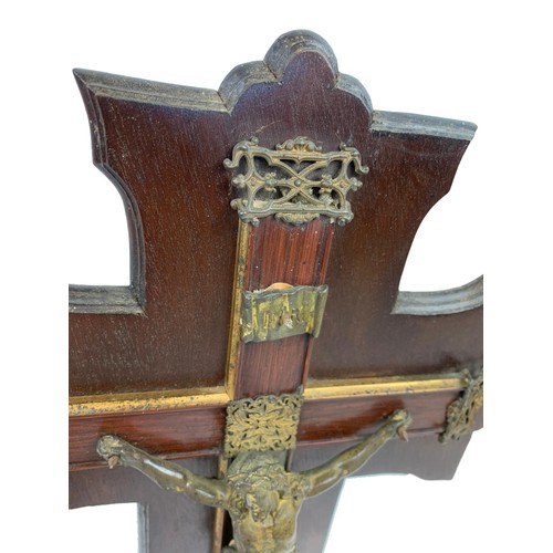 45b - A late 19th century crucifix with ornate gilded brass. 25 x 42.5cm