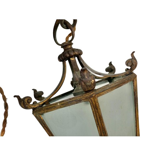 45f - An early 20th century ornate gilt brass hall or porch light fitting. Circa 1900/1920. 73cm including... 