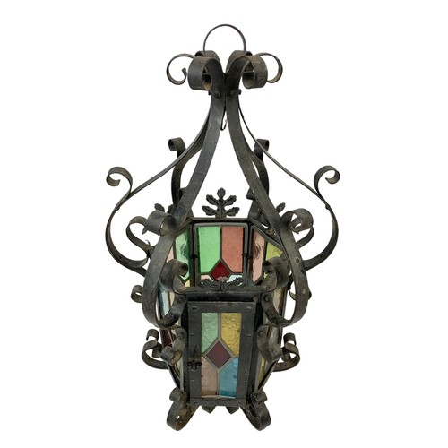 45g - A vintage wrought iron light fitting with stain glass. 29 x 60cm.