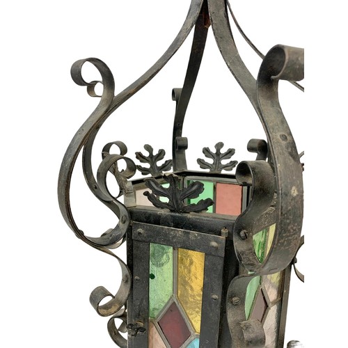 45g - A vintage wrought iron light fitting with stain glass. 29 x 60cm.