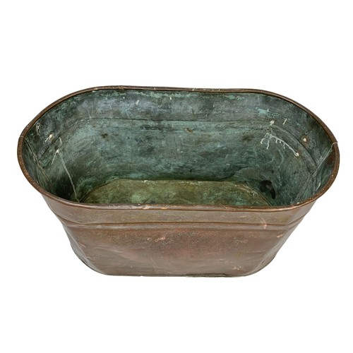 70b - A large early 20th century copper pot. Circa 1930. 59 x 30 x 32.5cm.