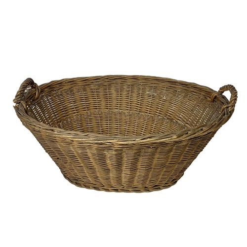 80e - A Edwardian wicker basket. 63 x 47 x 31cm