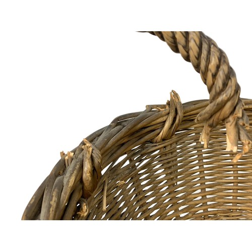 80e - A Edwardian wicker basket. 63 x 47 x 31cm