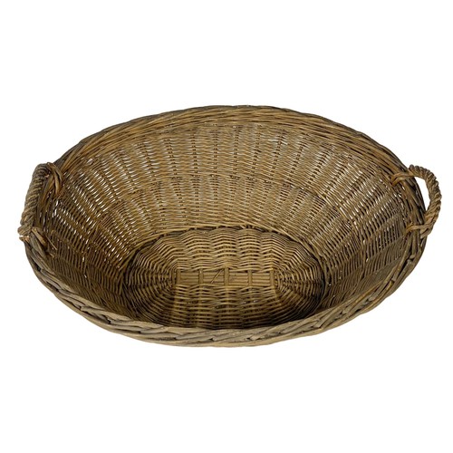 80e - A Edwardian wicker basket. 63 x 47 x 31cm