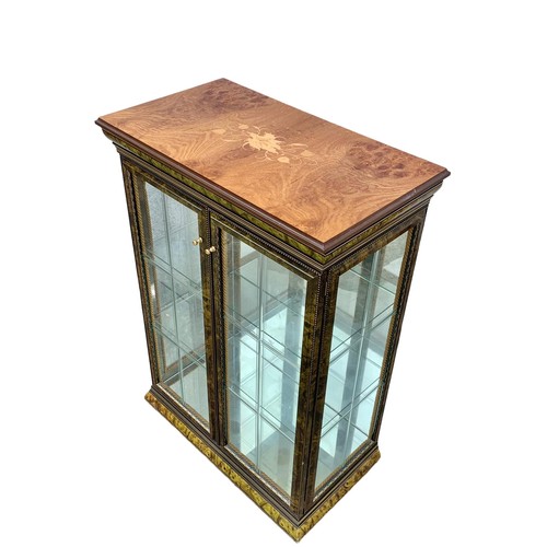 1182 - An Italian inlaid display cabinet with 2 glass shelves. 66 x 37 x 93cm