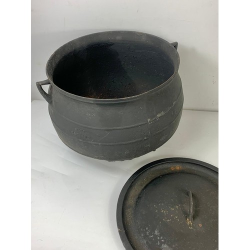 268v - A large early 20th century cast iron pot with lid.  49x43cm