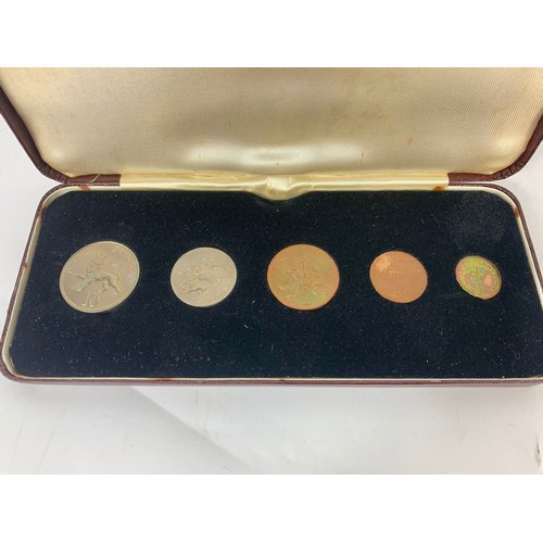 704 - A collection of vintage coin sets