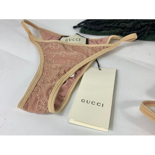 707 - Gucci underwear and a Christian Dior scarf.