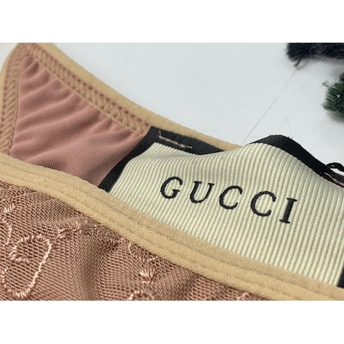 707 - Gucci underwear and a Christian Dior scarf.