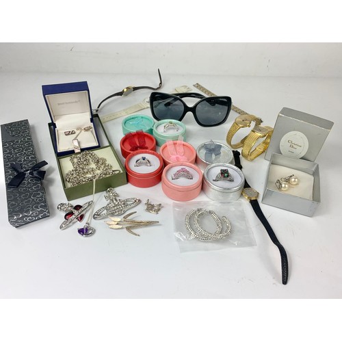 706 - A quantity of silver and costume jewellery.  Including pair of Christian Dior earrings, heavy solid ... 