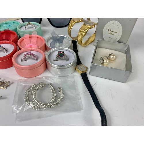 706 - A quantity of silver and costume jewellery.  Including pair of Christian Dior earrings, heavy solid ... 