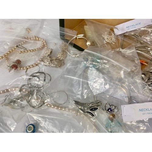 708 - A box of costume jewellery.