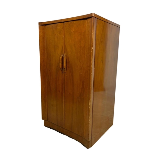 793 - Vintage walnut 2 door gramophone cabinet. Circa 1950. 53 x 53 x 96.5cm.