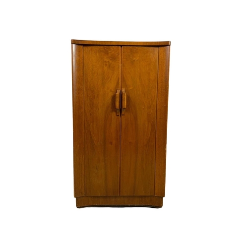 793 - Vintage walnut 2 door gramophone cabinet. Circa 1950. 53 x 53 x 96.5cm.