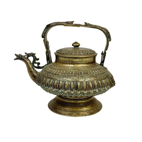 115 - A large 19th century heavy ornate heavy brass Middle Eastern kettle decorated with mythical dragons ... 