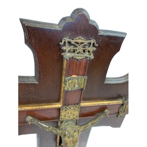 117 - A late 19th century crucifix with ornate gilded brass. 25 x 42.5cm