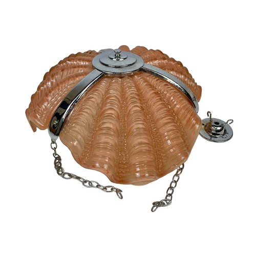 123 - A 1930’s Art Deco shell light fitting. 34 x 16cm. 37cm including chain