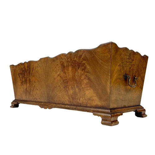 124 - An Edwardian mahogany planter with liner in the 1760’s style on ogee feet. 67 x 25.5 x 24.5cm.