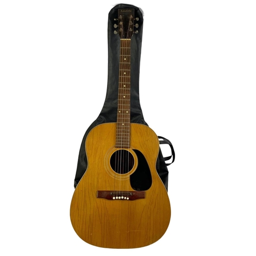 126 - A 1970’s Landola acoustic guitar in case. 101cm