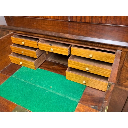 939 - Large early Victorian mahogany secretaire bookcase. Circa 1840. 134 x 60 x 217cm