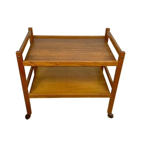 948 - A Danish teak 2 tier serving trolley by BRDR Furbo. Mid century. Circa 1960’s. 71 x 46 x 63.5cm.