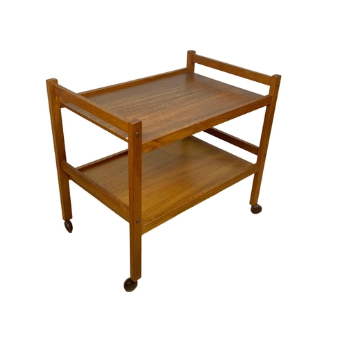 948 - A Danish teak 2 tier serving trolley by BRDR Furbo. Mid century. Circa 1960’s. 71 x 46 x 63.5cm.