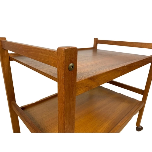 948 - A Danish teak 2 tier serving trolley by BRDR Furbo. Mid century. Circa 1960’s. 71 x 46 x 63.5cm.