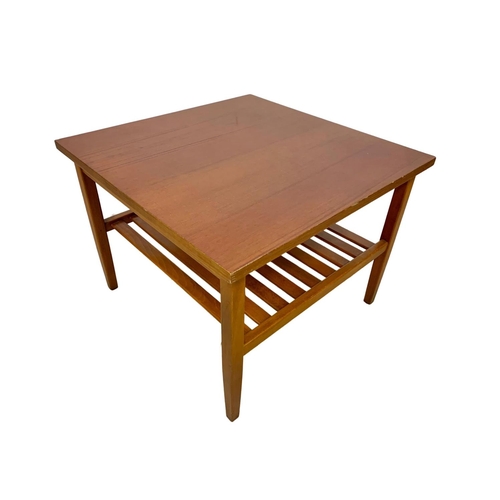 1043 - Teak 2 tier side table. Mid century. Circa 1970. 51 x 51 x 38cm.