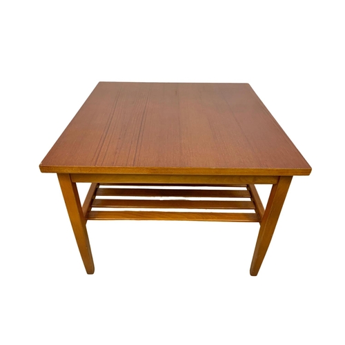 1043 - Teak 2 tier side table. Mid century. Circa 1970. 51 x 51 x 38cm.