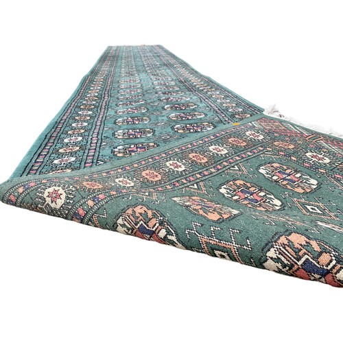 928a - A large vintage Middle Eastern runner rug. 80 x 496cm