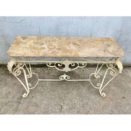 1026 - A large vintage ornate marble top console table on an wrought iron base. 142 x 46 x 90cm