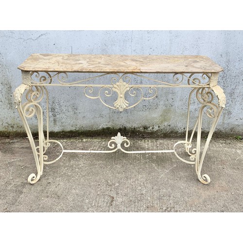 1026 - A large vintage ornate marble top console table on an wrought iron base. 142 x 46 x 90cm