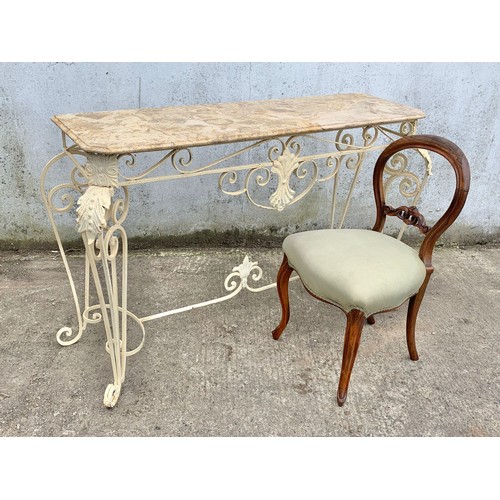 1026 - A large vintage ornate marble top console table on an wrought iron base. 142 x 46 x 90cm