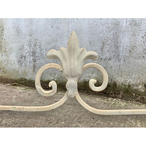 1026 - A large vintage ornate marble top console table on an wrought iron base. 142 x 46 x 90cm