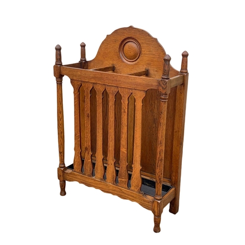 1006 - A late Victorian oak umbrella stick stand. Circa 1890/1900. 61.5 x 22.5 x 91cm.