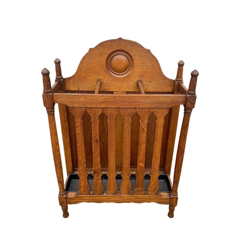 1006 - A late Victorian oak umbrella stick stand. Circa 1890/1900. 61.5 x 22.5 x 91cm.