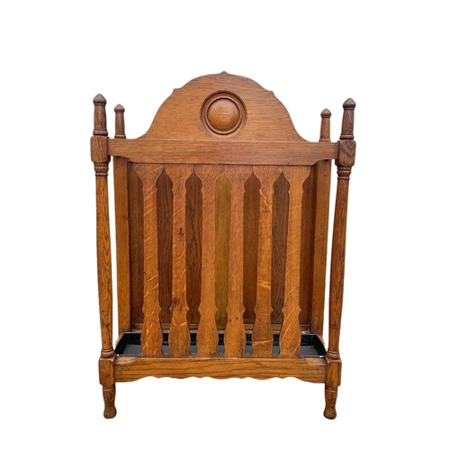 1006 - A late Victorian oak umbrella stick stand. Circa 1890/1900. 61.5 x 22.5 x 91cm.